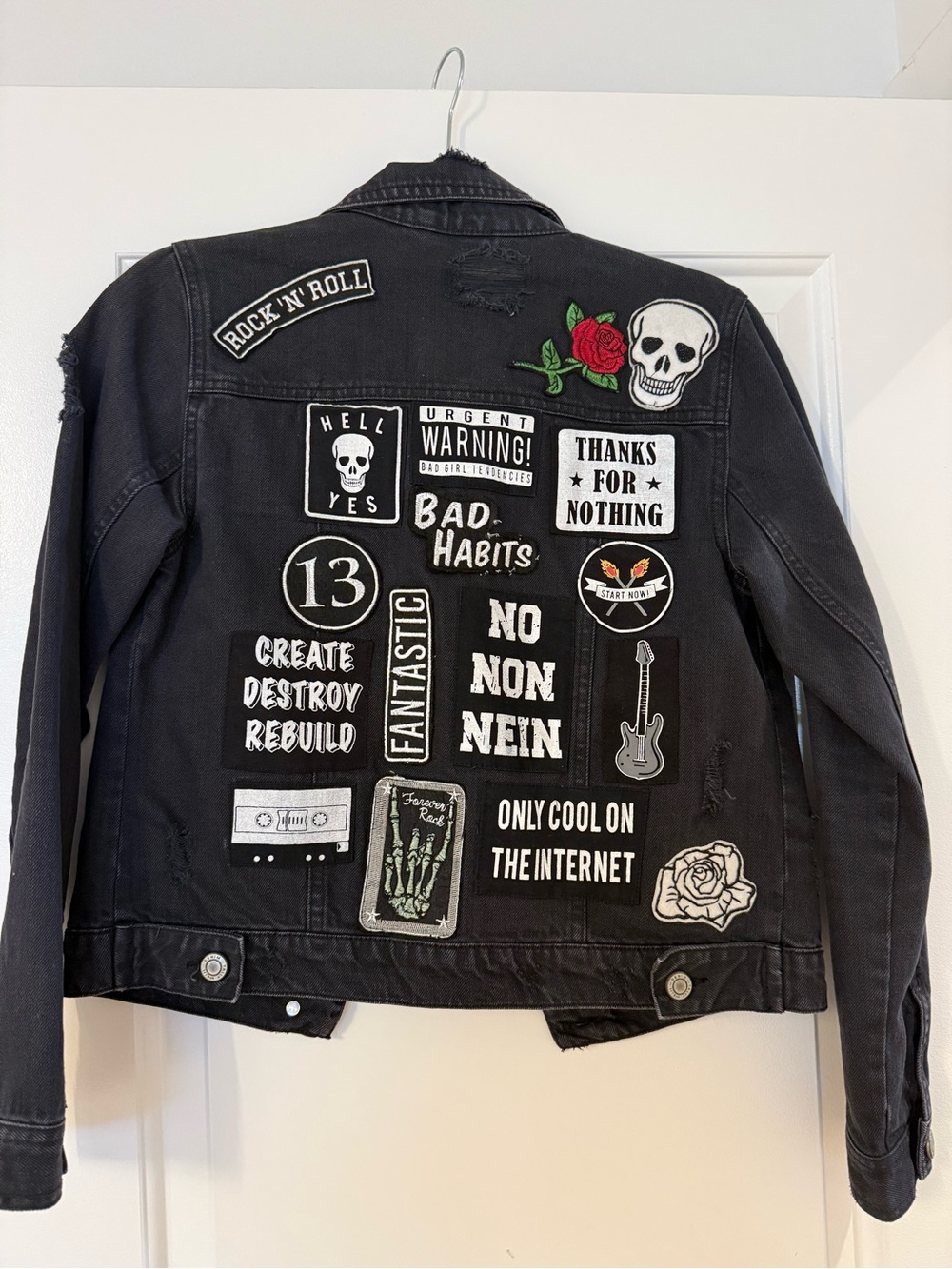 Black Denim Jacket with Badge Accents